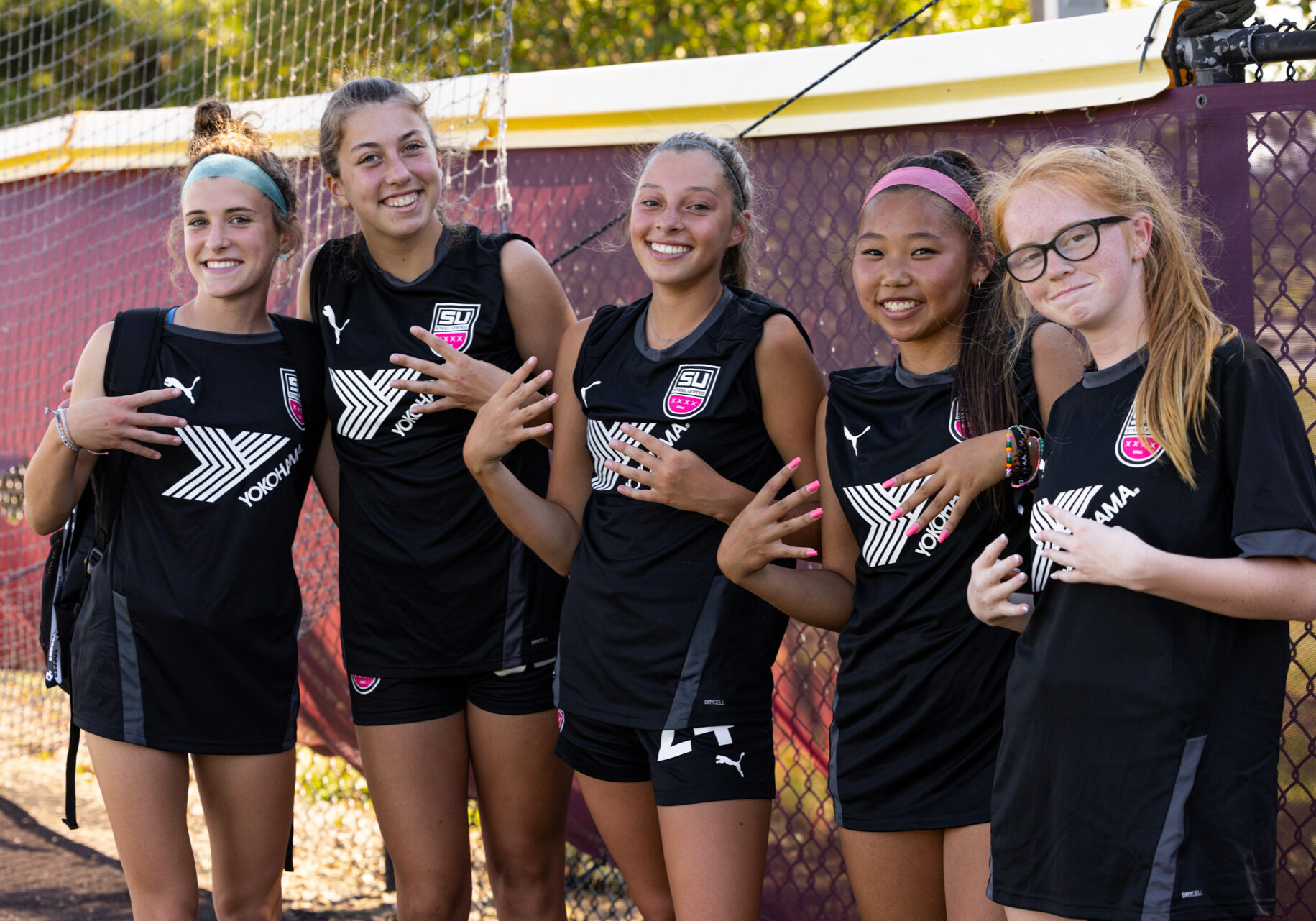 Steel United soccer players smiling together
