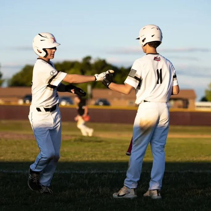 Team Steel baseball players on the field